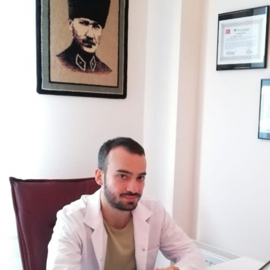 Dr. Melih Yuna